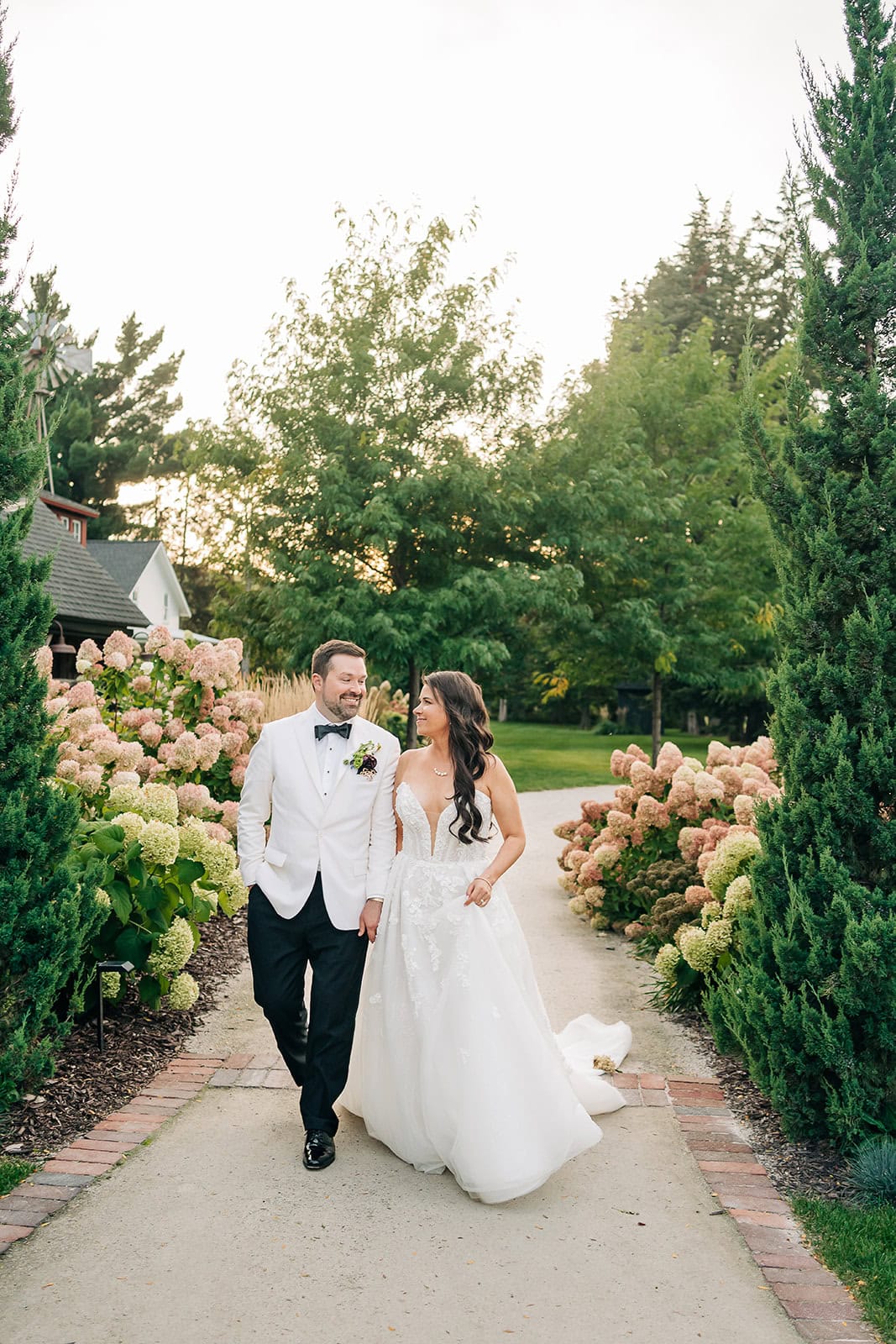 couples portraits at redeemed farm during golden hour