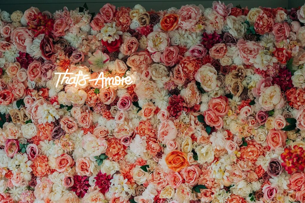 wedding reception flower wall at redeemed farm, mn