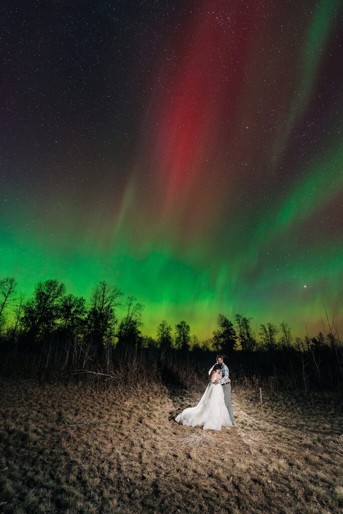 Northern Lights couple photo on Minnesota North Shore near Lake Superior