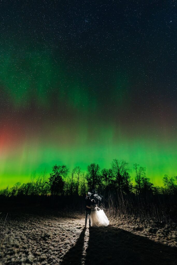 Northern Lights couple photography in North Shore Minnesota dark sky area