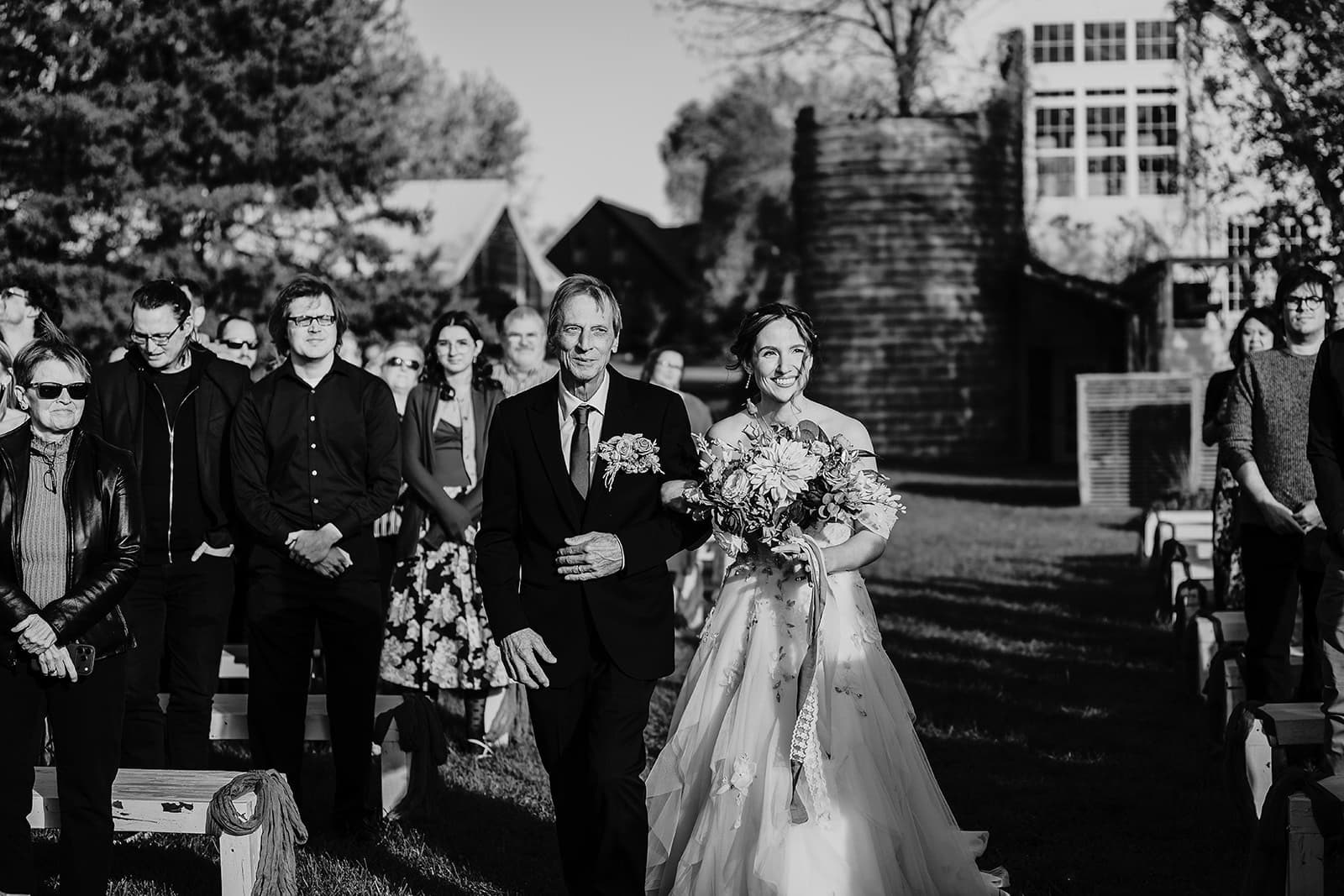 Bride walking down the aisle at Ivory North wedding venue outdoor ceremony