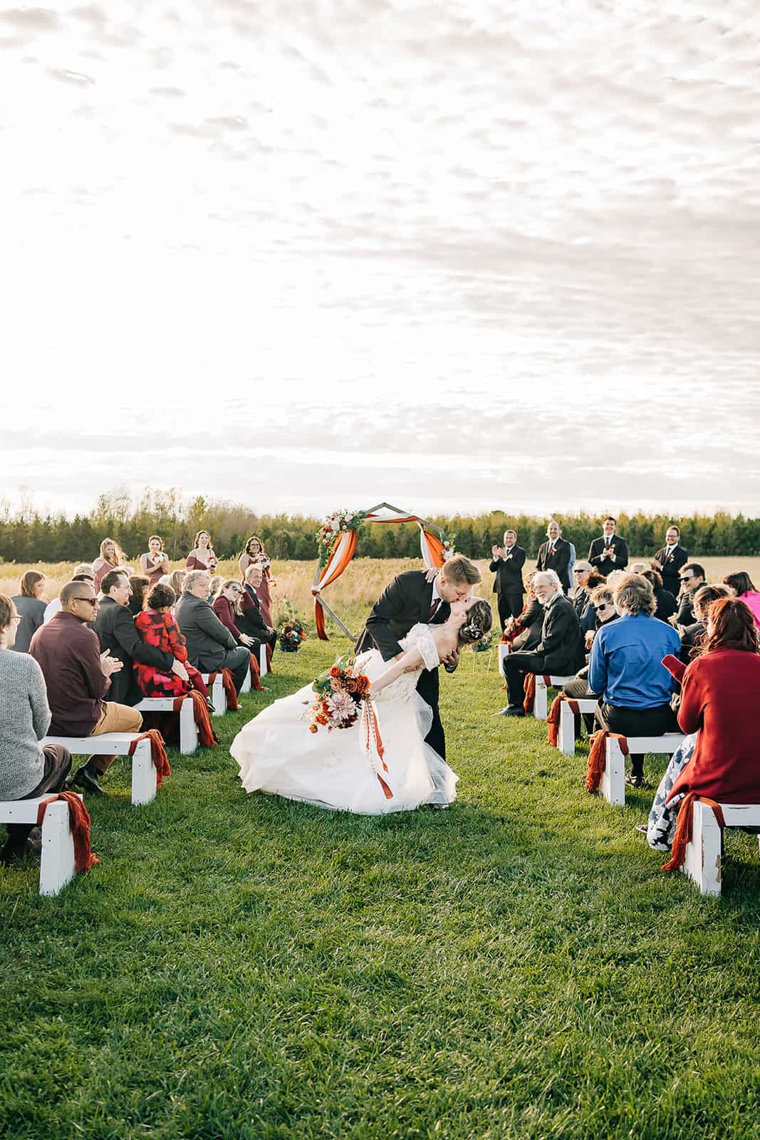 Ivory North ceremony space with white benches