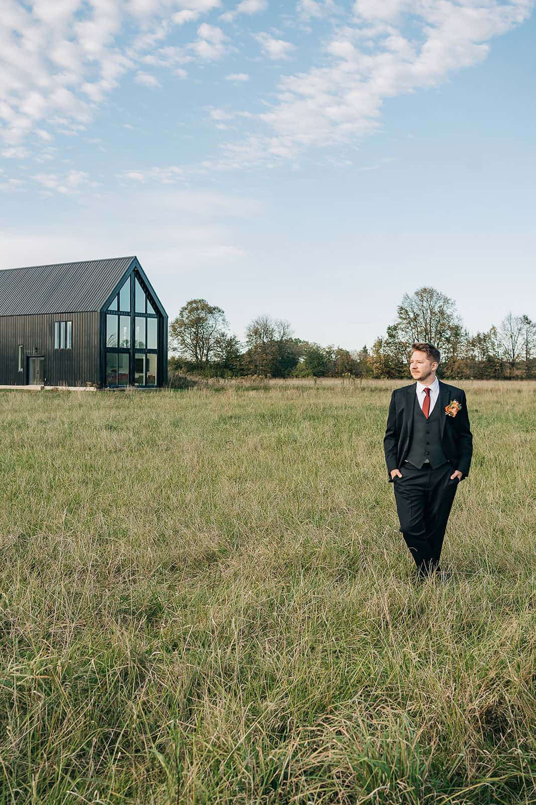 groom morning portraits at getting ready suite, ivory north