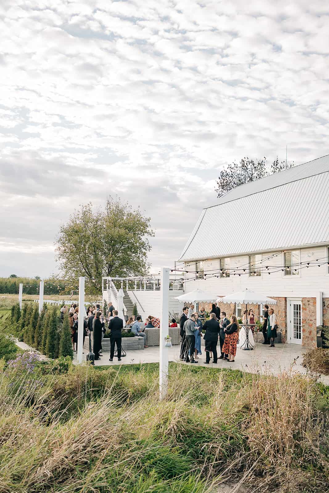 Guests mingling during cocktail hour at MN wedding venue