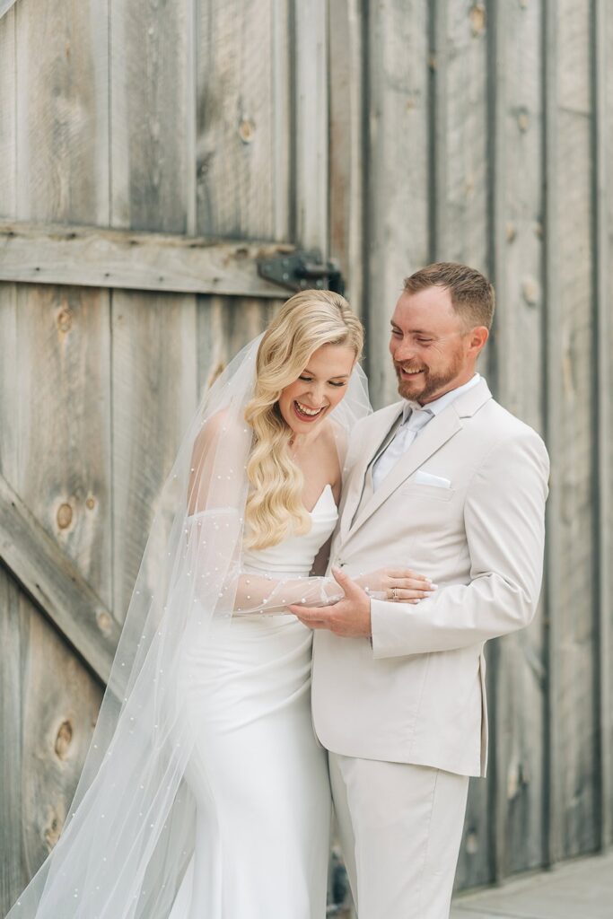 Candid couple portrait on Creekside Farm property in Rush City MN