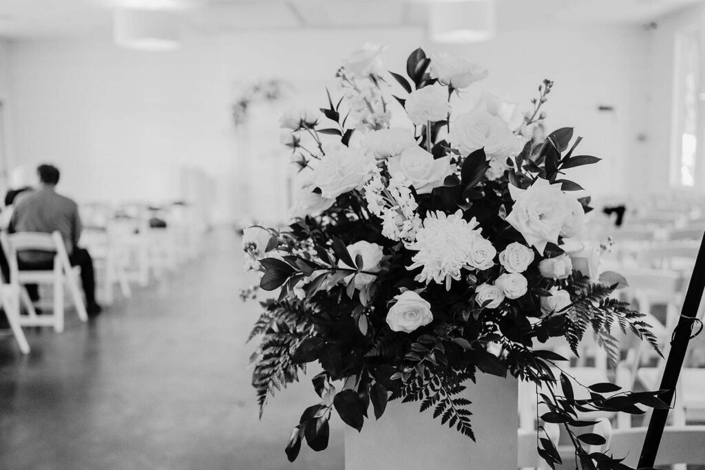 Wedding ceremony chairs and aisle design in black and white