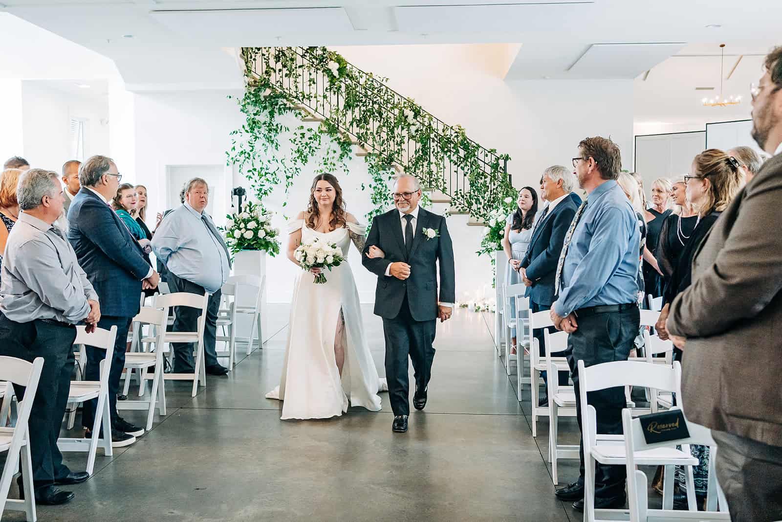 Bride walking down the aisle at hutton house wedding