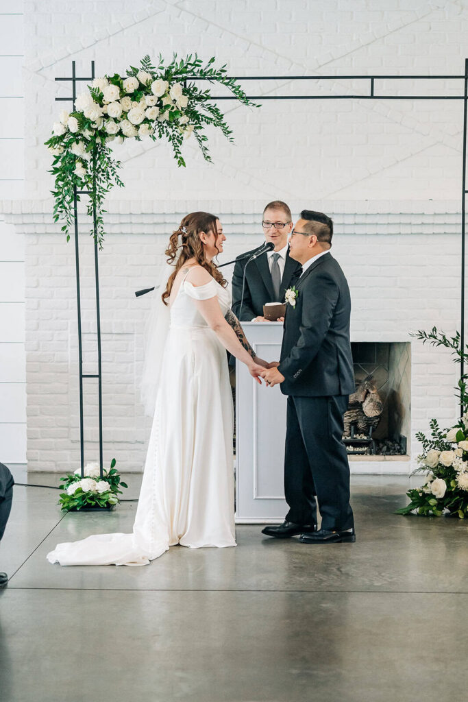 Wedding ceremony with floor to ceiling windows near Minneapolis