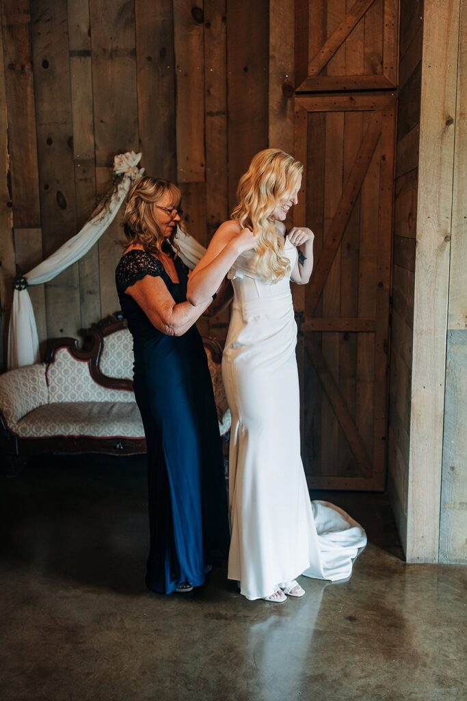 Bride getting ready in bridal suite at Creekside Farm Wedding Venue in Rush City MN