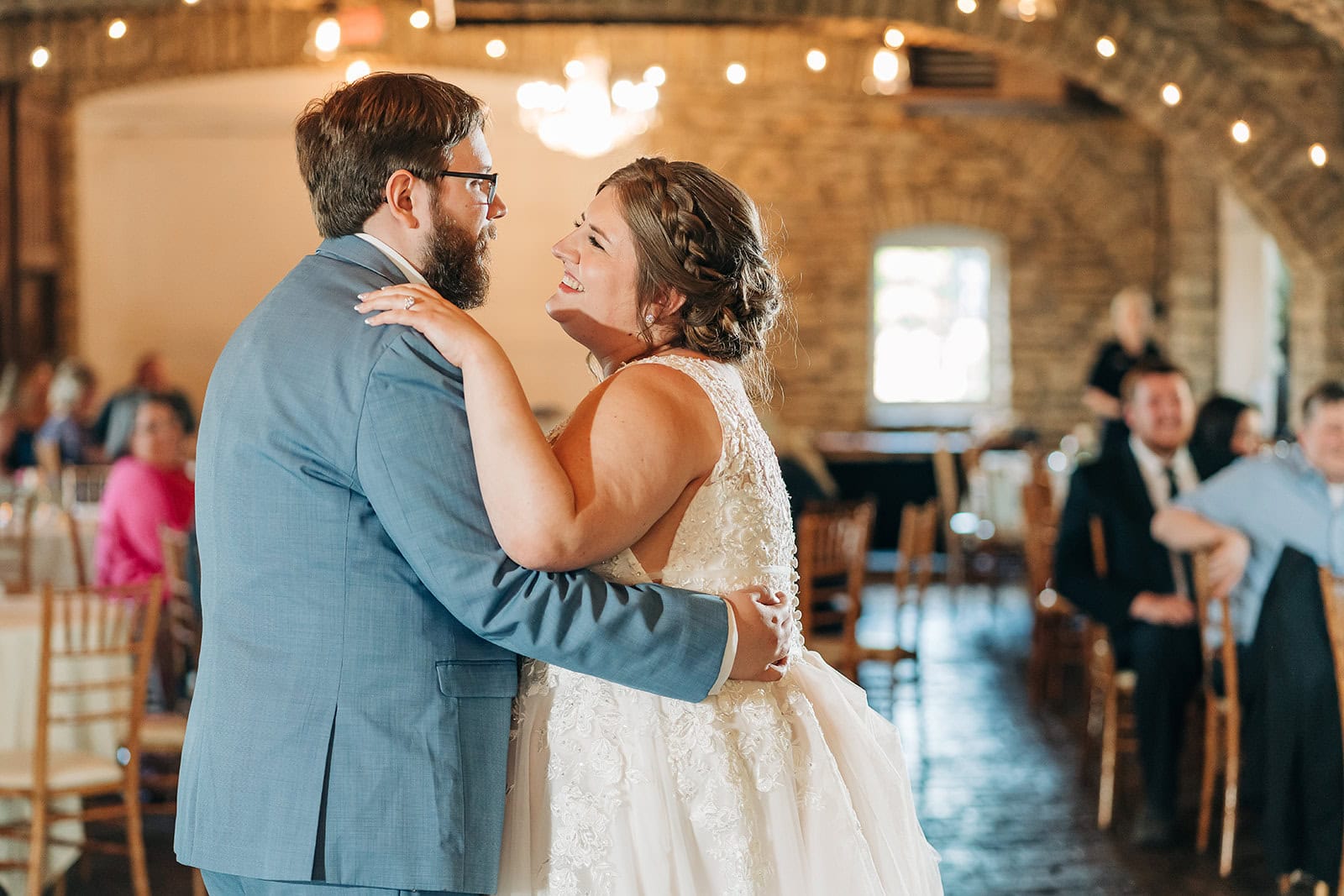 first dance inside Mayowood Stone Barn reception space
