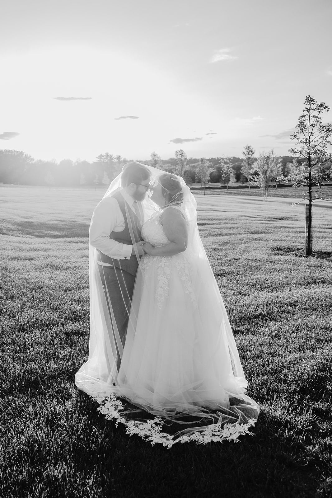 romantic field portraits near Mayowood wedding venue