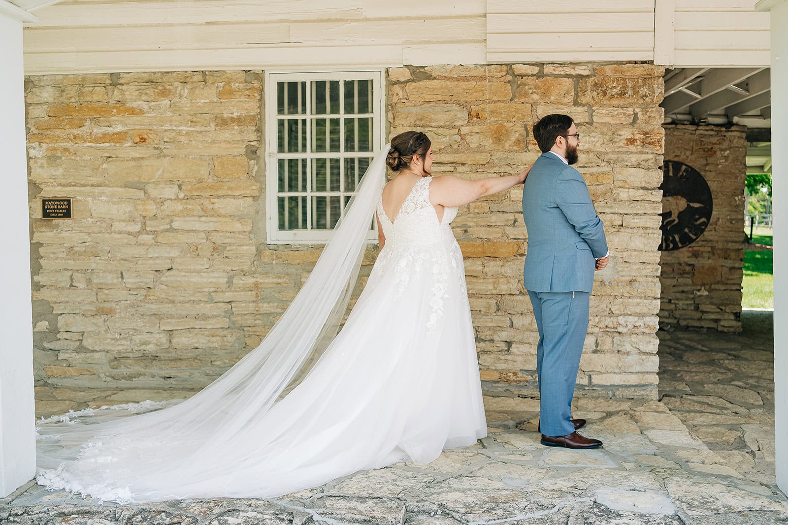 bride and groom share first look on wedding day in minnesota